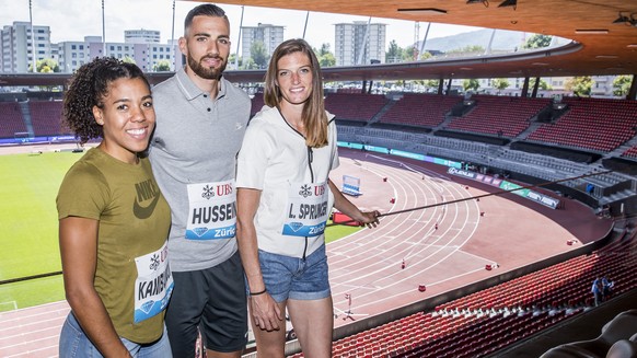 Swiss athletes Mujinga Kambundji, Kariem Hussein and Lea Sprunger, from left, pose at a media talk prior to the Weltklasse IAAF Diamond League international athletics meeting at the stadium Letzigrund ...