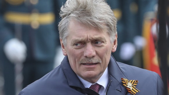 epa09935519 Kremlin spokesman Dmitry Peskov during the Victory Day military parade on the Red Square in Moscow, Russia, 09 May 2022. Russia marks Victory Day, Nazi Germany's unconditional surrender in ...