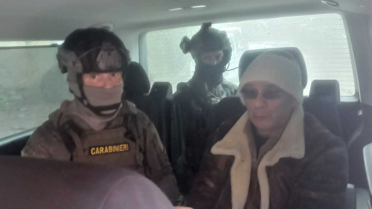 FILE - In this Italian Carabinieri handout photo made available on Jan. 16, 2023, top Mafia boss Matteo Messina Denaro, right, is seen in a car with Italian Carabinieri officers soon after his arrest  ...