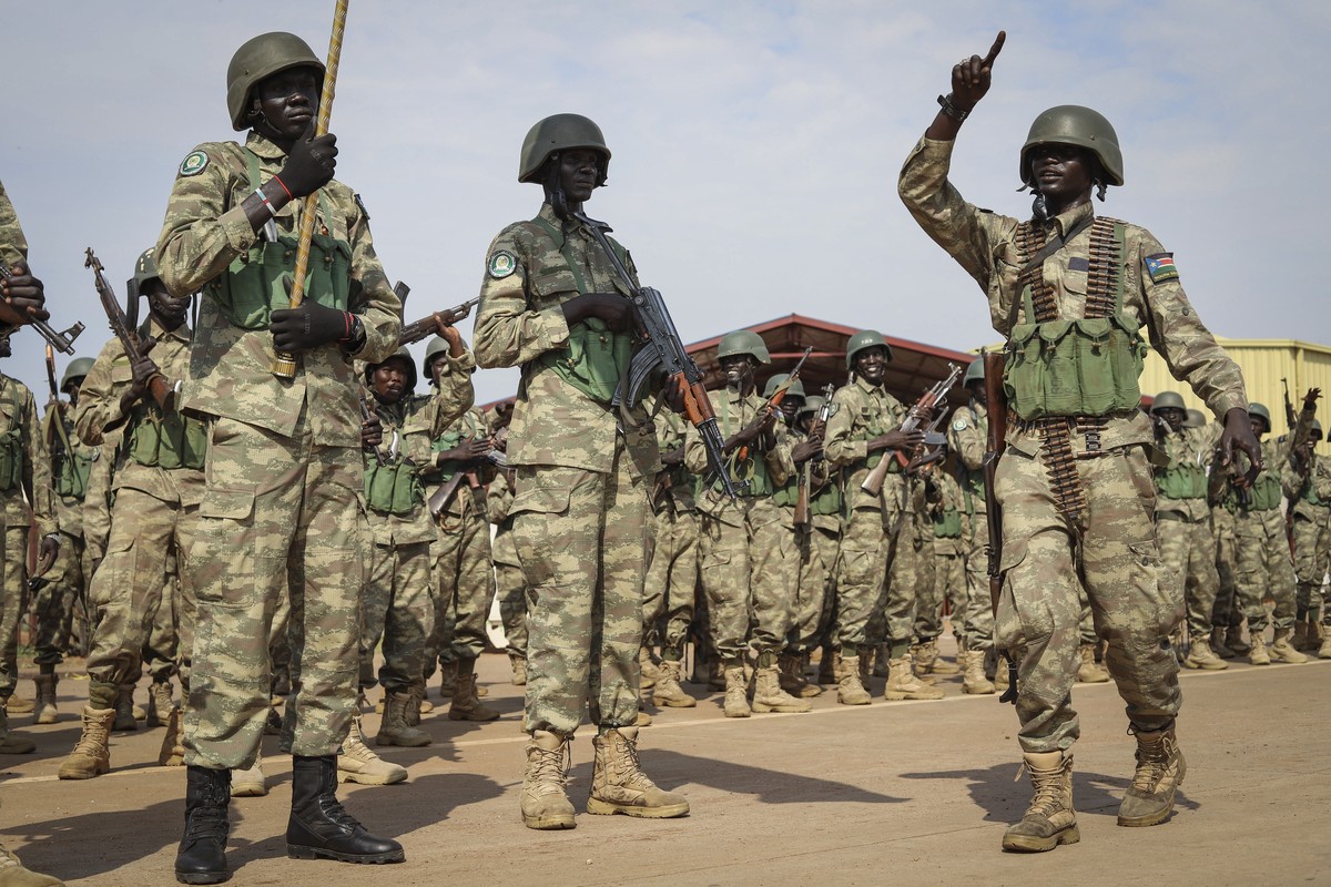 Soldiers from the South Sudan People's Defence Forces (SSPDF) prepare to board a flight to transport them to eastern Congo, where they are due to operate as part of the East Africa Community Regi ...