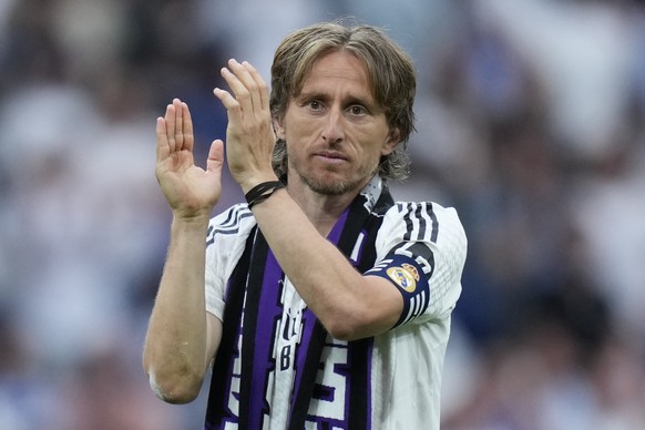 Real Madrid&#039;s Luka Modric applauds after a Spanish La Liga soccer match against Real Sociedad at the Santiago Bernabeu stadium in Madrid, Saturday, May 24, 2025. (AP Photo/Cesar Cebolla)
Spain So ...