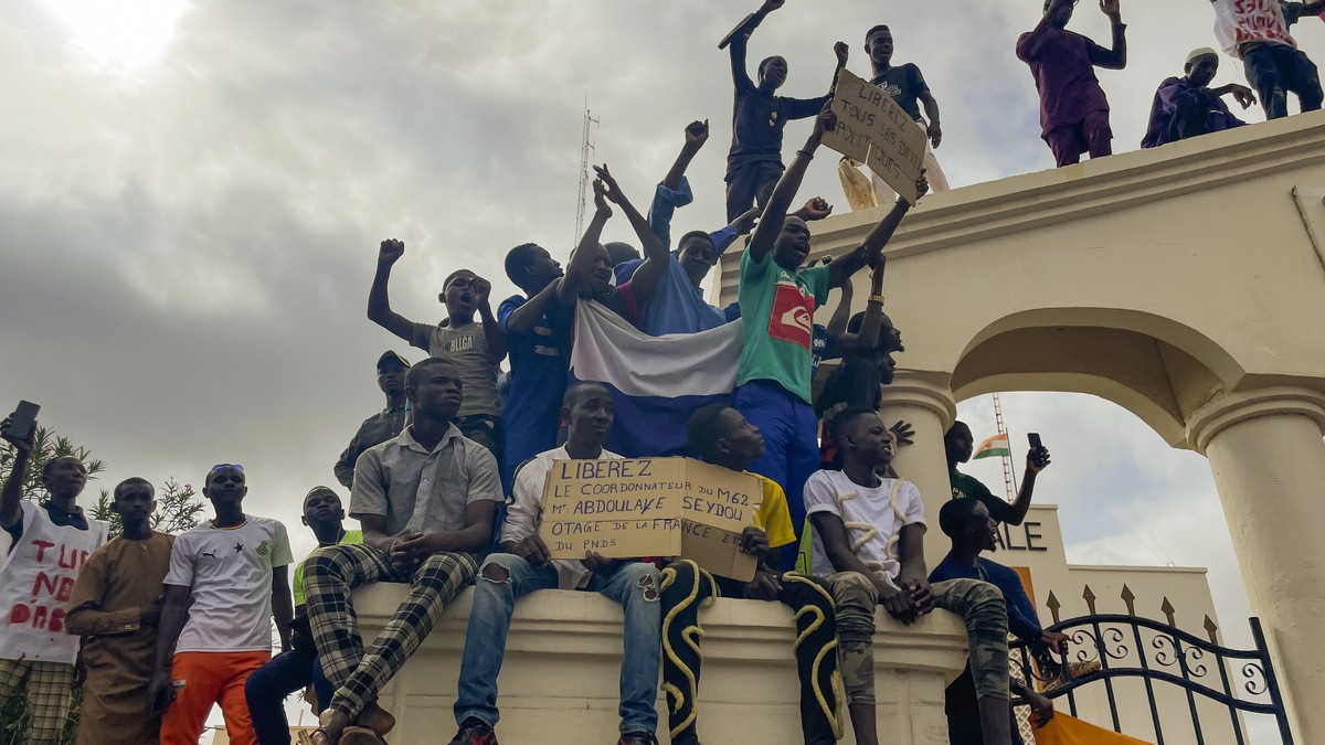 Supporters of Niger's ruling junta gather at the start of a protest called to fight for the country's freedom and push back against foreign interference in Niamey, Niger, Thursday, Aug. 3, 2 ...
