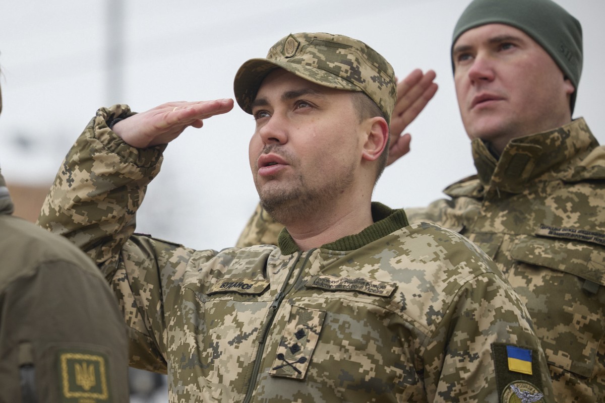 Maj. Gen. Kyrylo Budanov, Ukraine's military intelligence chief, center, attends a commemorative event on the occasion of the Russia Ukraine war one year anniversary in Kyiv, Ukraine, Friday, Feb ...