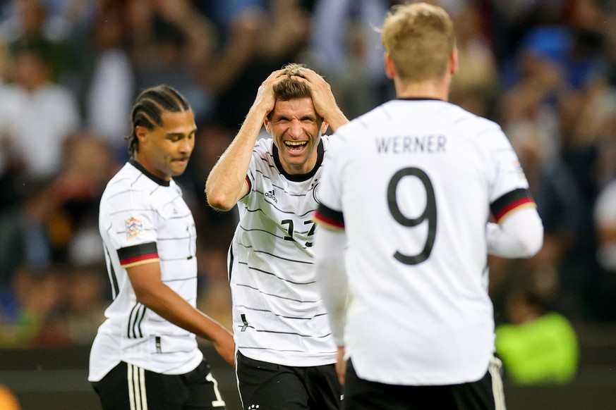 epa10013434 German players Thomas Mueller (C) and Timo Werner (R) celebrate a goal during the UEFA Nations League soccer match between Germany and Italy in Moenchengladbach, Germany, 14 June 2022. EPA ...