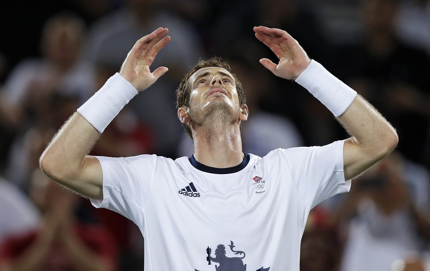 Andy Murray, of England, reacts after defeating Juan Martin del Potro, of Argentina, to win the men&#039;s singles gold medal at the 2016 Summer Olympics in Rio de Janeiro, Brazil, Sunday, Aug. 14, 20 ...