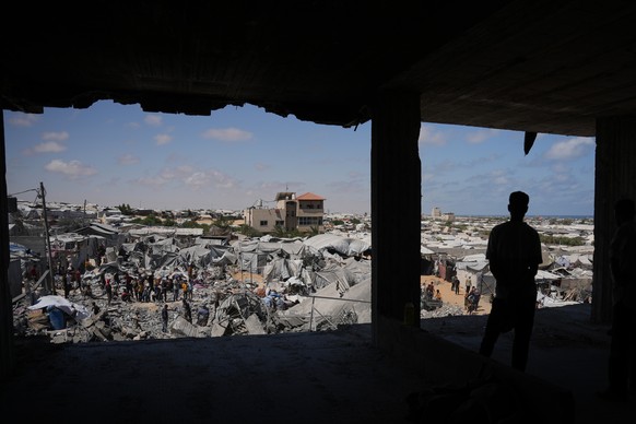 Palestinians inspect the rubble of a building destroyed in an Israeli airstrike at Khan Younis, in the southern Gaza Strip, Sunday, June 7, 2026. (AP Photo/Abdel Kareem Hana)
Israel Palestinians Gaza