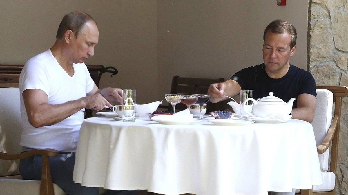 Oct. 19, 2015 - Sochi, Russia - Russian President Vladimir Putin has a casual lunch with Prime Minister Dmitry Medvedev following an exercise session at the Bocharov Ruchei residence August 30, 2015 i ...