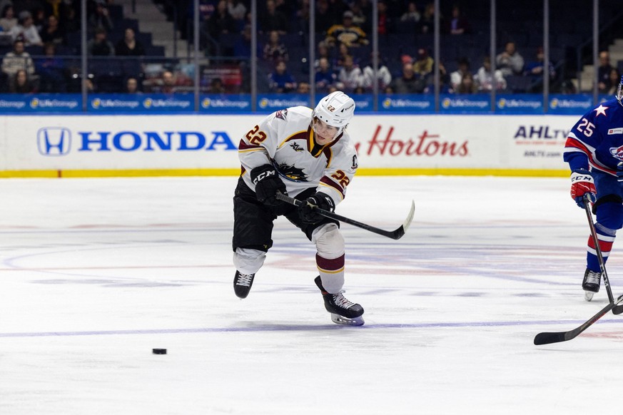 March 18, 2022: Cleveland Monsters defenseman Tim Berni 22 skates with the puck in the first period against the Rochester Americans. The Rochester Americans hosted the Cleveland Monsters in an America ...