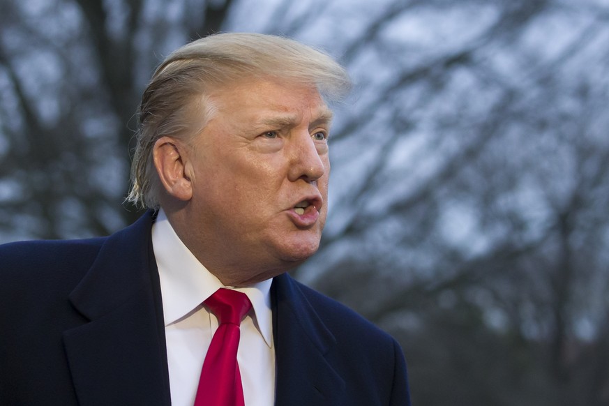 President Donald Trump speaks with the media after stepping off Marine One on the South Lawn of the White House, Sunday, March 24, 2019, in Washington. The Justice Department said Sunday that special  ...