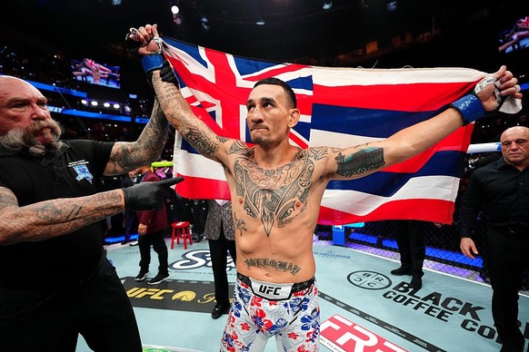 LAS VEGAS, NEVADA - JULY 11: Max Holloway reacts to his win in a welterweight fight during the UFC 329 event at T-Mobile Arena on July 11, 2026 in Las Vegas, Nevada. (Photo by Jeff Bottari/Zuffa LLC)