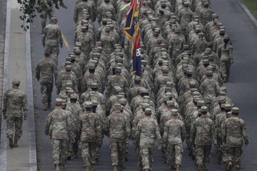 epa12175968 US military service members march during a military parade commemorating the 250th anniversary of the United States Army in Washington, DC, USA, 14 June 2025. The parade, which happens to ...