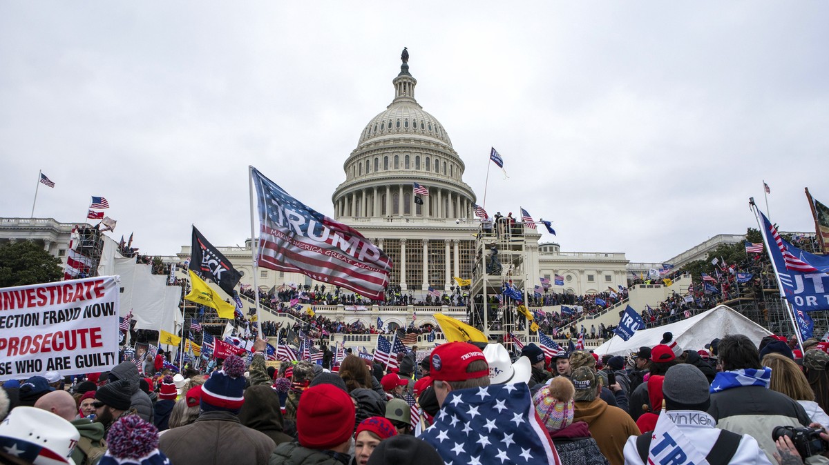Supporters of President Donald Trump rally at the U.S. Capitol on Jan. 6, 2021, in Washington. As a winter storm bore down on the nation's capital four years later, lawmakers would again gather a ...