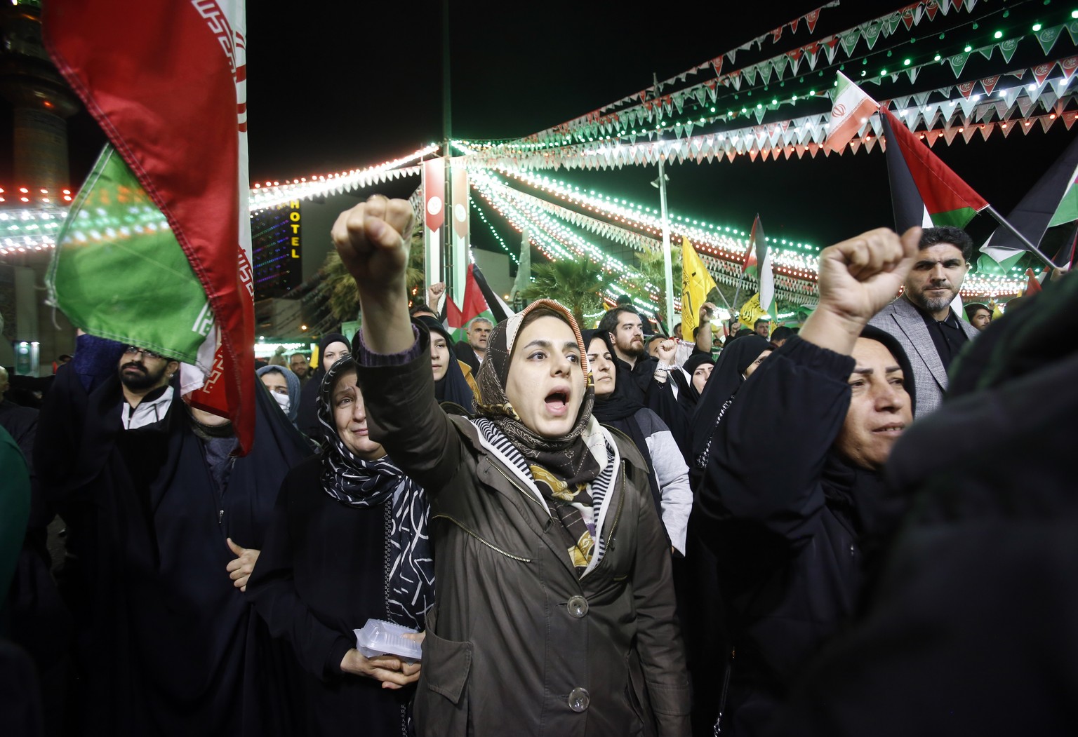 epa11254916 Iranians shout slogans during an anti-Israeli demonstration at Palestine Square in Tehran, Iran, 01 April 2024. According to IRNA News Agency, Israel on 01 April launched an airstrike targ ...
