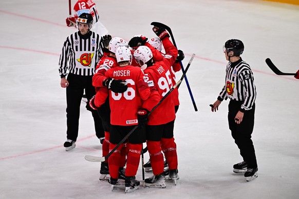 epa12132302 Switzerland&#039;s players celebrate the 7-0 goal in the IIHF Ice Hockey World Championship semifinal match between Switzerland and Denmark at Avicii Arena in Stockholm, Sweden, 24 May 202 ...