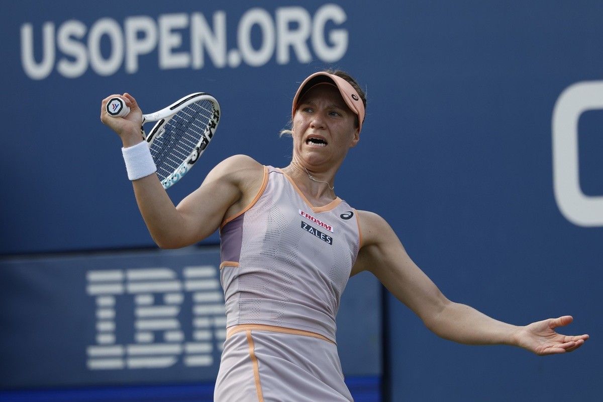 epa11566071 Viktorija Golubic of Switzerland in action against Paula Badosa of Spain (unseen) during their first round match of the US Open Tennis Championships at the USTA Billie Jean King National T ...