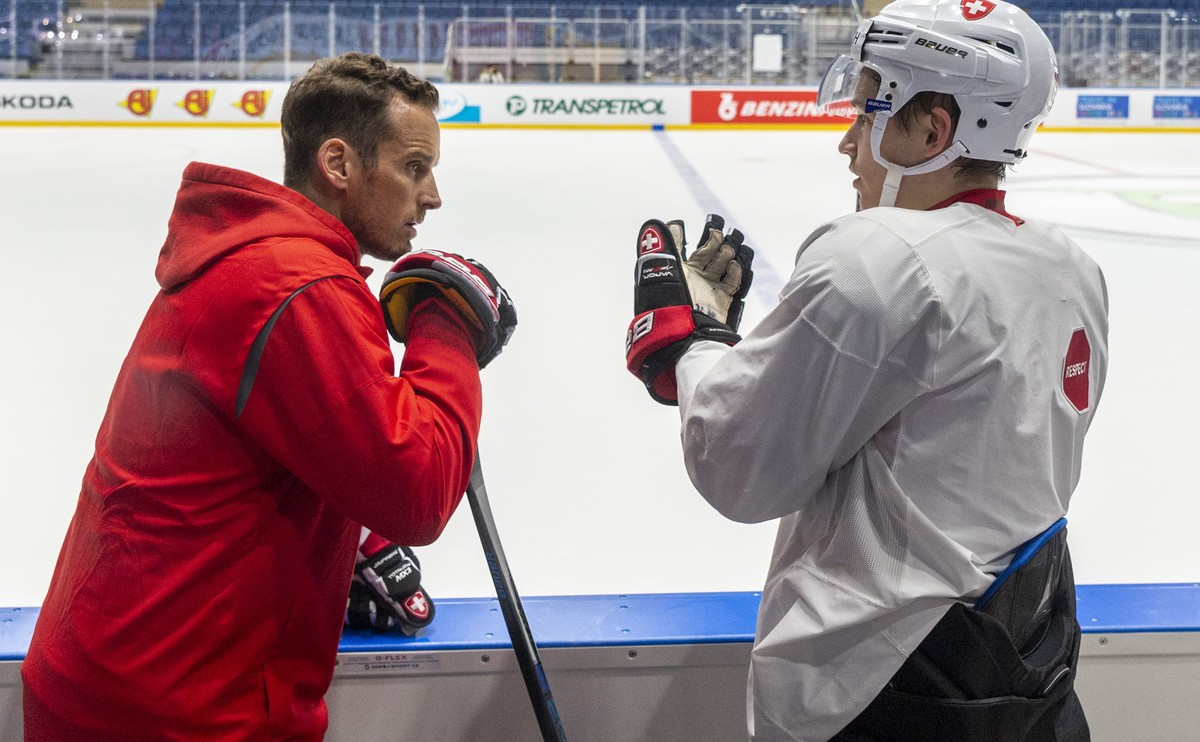 Switzerland's coach Patrick Fischer and Switzerland's Philipp Kurashev during a training session of the Swiss team at the IIHF 2019 World Ice Hockey Championships, at the Ondrej Nepela Arena ...