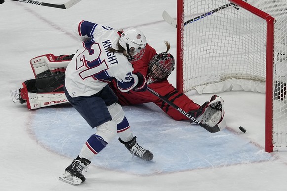 United States&#039; Hilary Knight (21) scores past Canada goalkeeper Ann-Renee Desbiens (35) during the women&#039;s gold medal hockey game at the 2022 Winter Olympics, Thursday, Feb. 17, 2022, in Bei ...