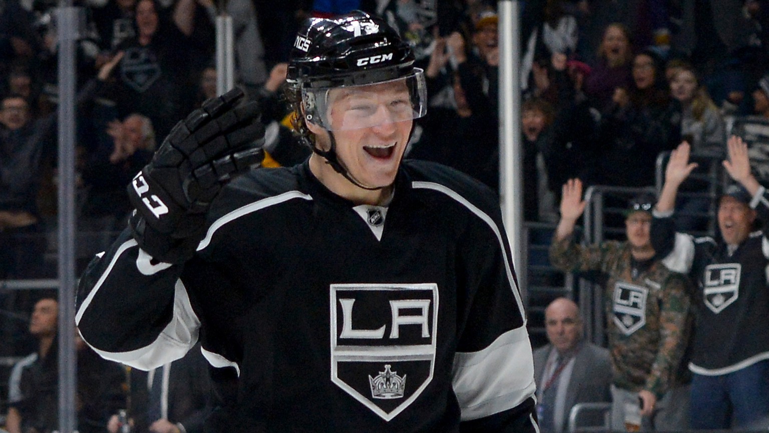 Apr 2, 2016; Los Angeles, CA, USA; Los Angeles Kings center Tyler Toffoli (73) celebrates after an assist on a goal by Los Angeles Kings center Jeff Carter (77) past Dallas Stars goalie Kari Lehtonen  ...