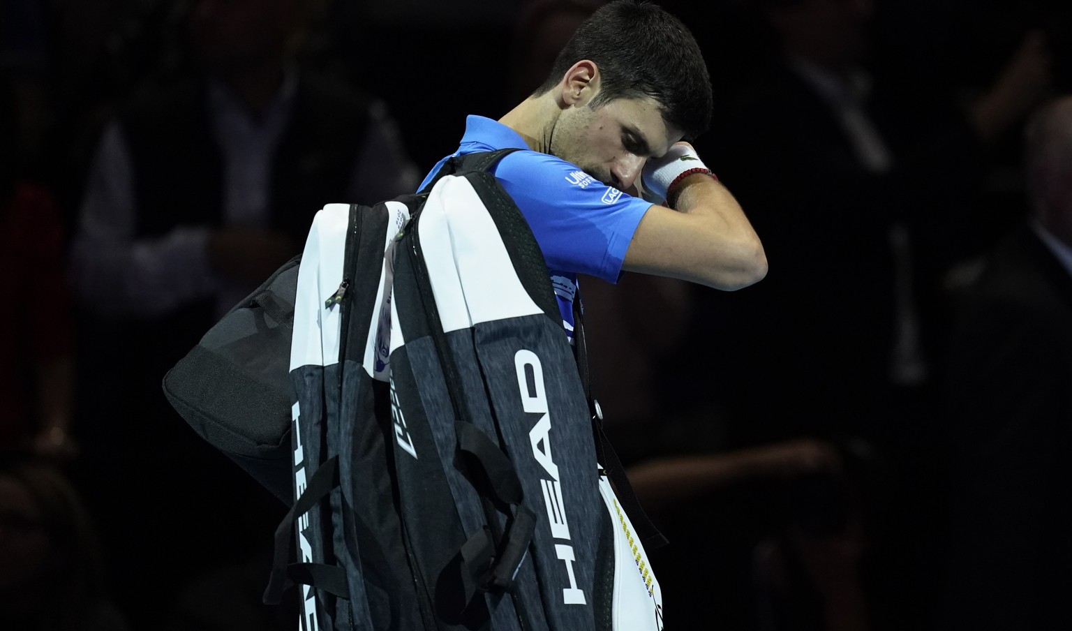epa07997101 Novak Djokovic of Serbia reacts after losing his round robing match against Roger Federer of Switzerland at the ATP World Tour Finals tennis tournament in London, Britain, 14 November 2019 ...