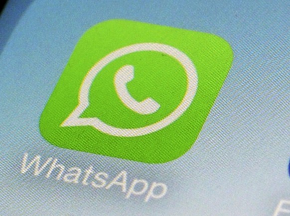 FILE - This Feb. 19, 2014, file photo, shows WhatsApp app icon on a smartphone in New York. WhatsApp parent Meta is moving forward with its push to attract businesses to its popular chat app. Its part ...