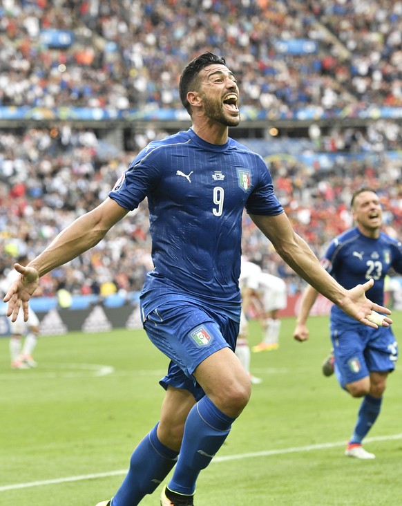 Italy&#039;s Graziano Pelle celebrates after scoring his sideÂs second goal during the Euro 2016 round of 16 soccer match between Italy and Spain, at the Stade de France, in Saint-Denis, north of Par ...