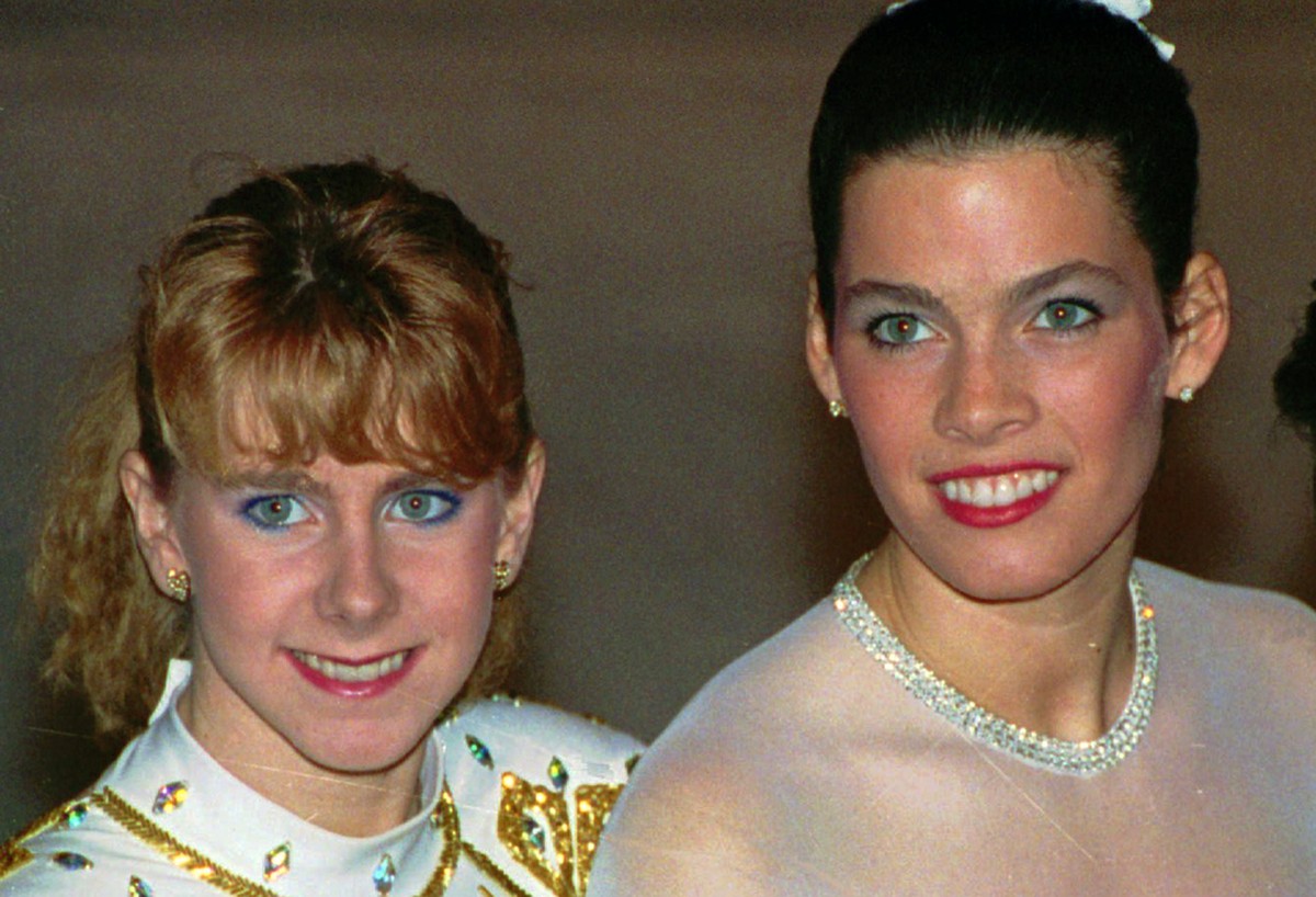 ADVANCE FOR MONDAY, DEC. 23 - FILE - In this Jan. 12, 1992, file photo, Tonya Harding, left, and Nancy Kerrigan appear at the U.S. Figure Skating Championships in Orlando, Fla. It's been nearly 2 ...