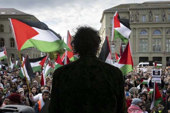 Former National Councillor Geri Mueller speaks during an authorized rally in solidarity with Palestine, at the Federal square, in Bern, Switzerland, on Saturday, October 28, 2023. Thousands of Israeli ...