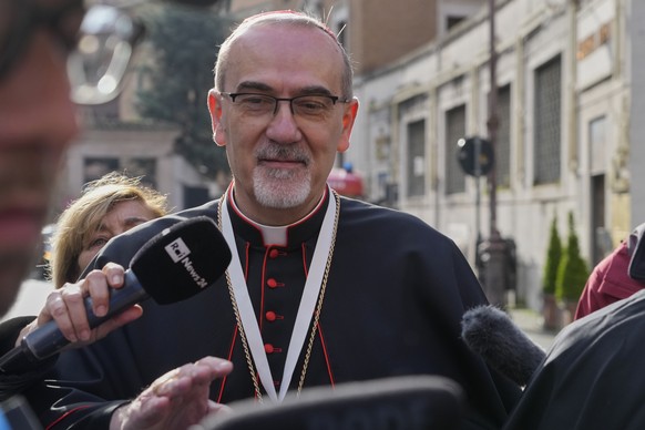 Cardinal Pierbattista Pizzaballa is approached by reporters as he arrives for a college of cardinals&#039; meeting, at the Vatican, Monday, April 28, 2025. (AP Photo/Gregorio Borgia)
Vatican Pope