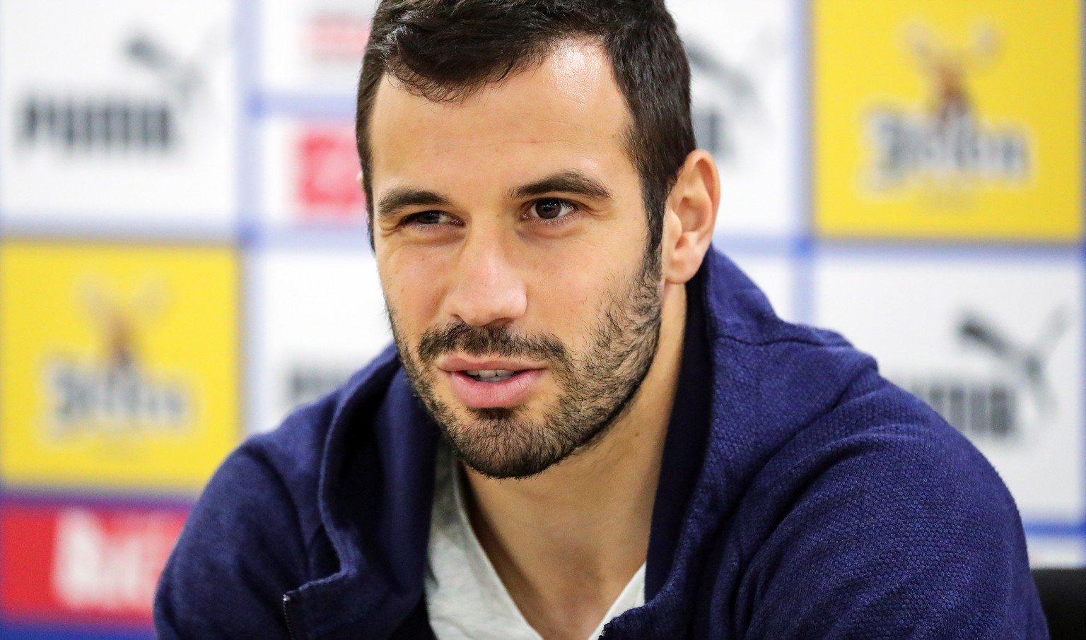 epa06820662 Serbian national soccer team player Luka Milivojevic speaks during a press conference in Svetlogorsk, Russia, 19 June 2018. Serbia will face Switzerland in the FIFA World Cup 2018 group E  ...