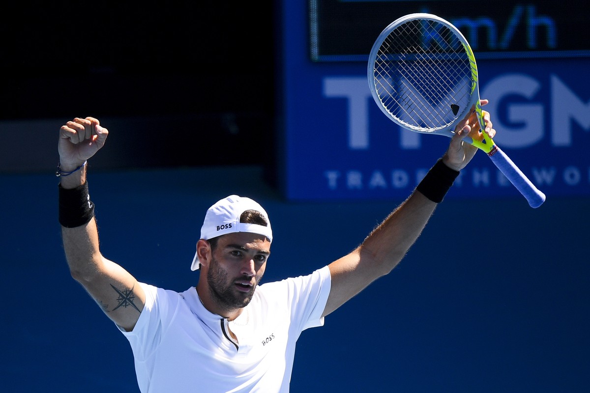 epa09690527 Matteo Berrettini of Italy celebrates his win over Brandon Nakashima of the United States during their first round match on Day 1 of the Australian Open tennis tournament, at Melbourne Par ...