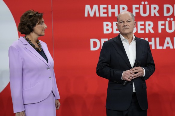 German Chancellor Olaf Scholz, right, and his wife Britta Ernst after first projections are announced during the election party at the Social Democratic Party (SPD) headquarters in Berlin, Germany, Su ...