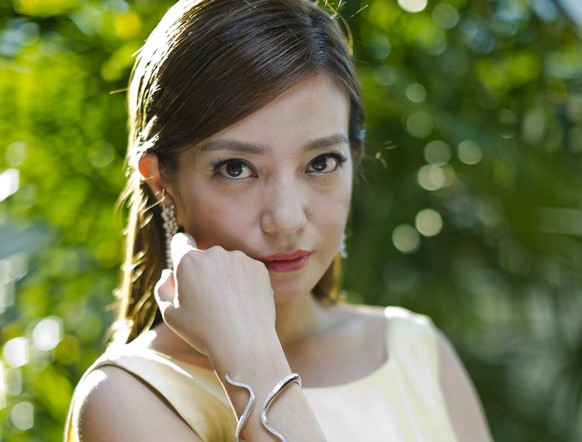 Actress Zhao Wei poses for portraits during the 71st edition of the Venice Film Festival in Venice, Italy, Thursday, Aug. 28, 2014. (AP Photo/Domenico Stinellis)