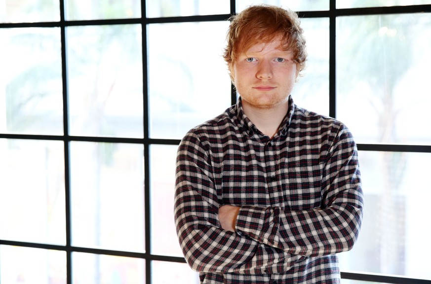 In this Monday, June 16, 2014 photo, Ed Sheeran poses for a portrait in Los Angeles. Promoting an album is a creativity-killer, says Sheeran, preferring to watch a World Cup game rather than chat abou ...