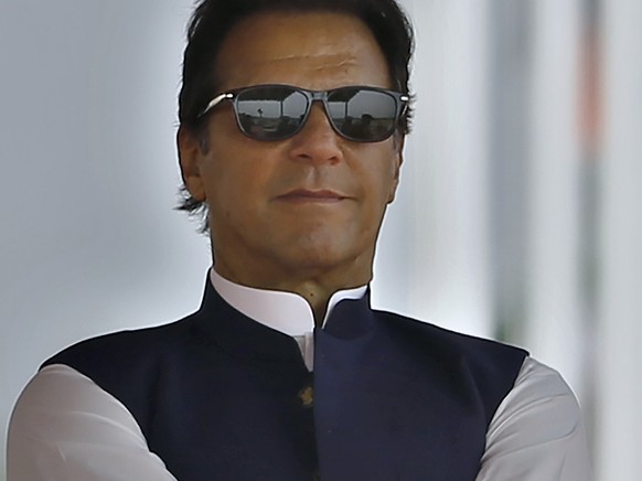 FILE - Pakistan&#039;s Prime Minister Imran Khan attends a military parade to mark Pakistan National Day, in Islamabad, Pakistan, Wednesday, March 23, 2022. Pakistan&#039;s Supreme Court on Thursday,  ...