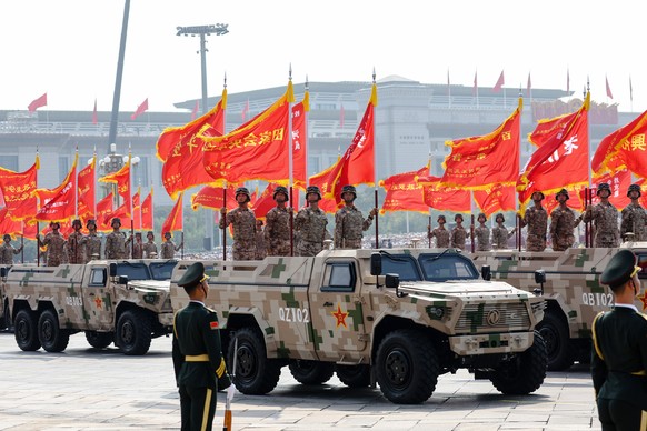 epa12347660 Chinese troops and armoured vehicles are seen during a military parade marking the 80th anniversary of the end of the Sino-Japanese War in Beijing, China, 03 September 2025. China holds on ...