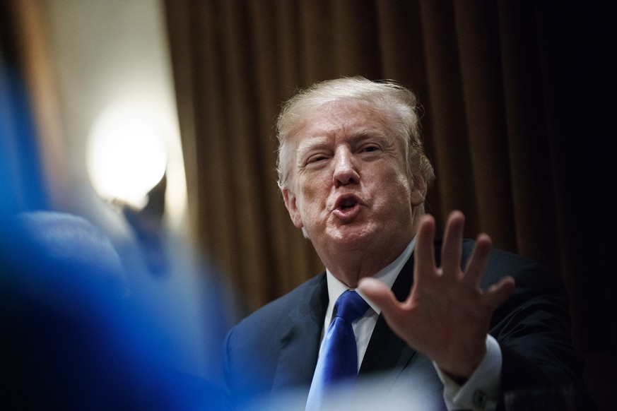 President Donald Trump speaks in the Cabinet Room of the White House, in Washington, Wednesday, Feb. 28, 2018, during a meeting with members of congress to discuss school and community safety. (AP Pho ...