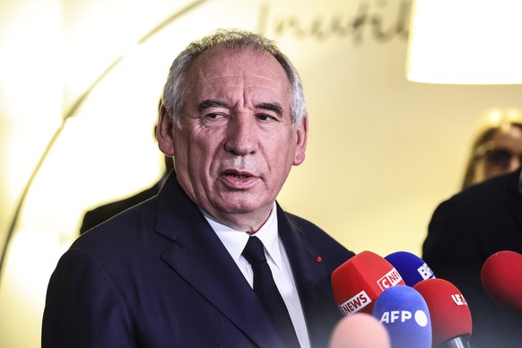 epa12275344 French Prime Minister Francois Bayrou speaks to the press following a visit to the TRACFIN site, the French financial investigation unit, in Montreuil, Paris suburbs, France, 31 July 2025. ...