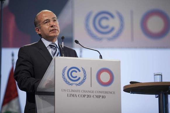 epa04525184 Handout photo released by COP20 on, 11 December 2014, showing former Mexican President Felipe Calderón, during a plenary session at the 20th UN Climate Change Conference COP20 held in the  ...