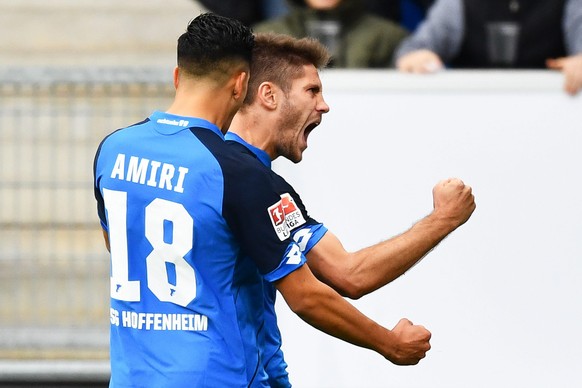 epa05586716 Hoffenheim&#039;s Andrej Kramaric (R) celebrates with his teammate Nadiem Amiri (L) after scoring the 2-1 lead from the penalty spot during the German Bundesliga soccer match between TSG 1 ...