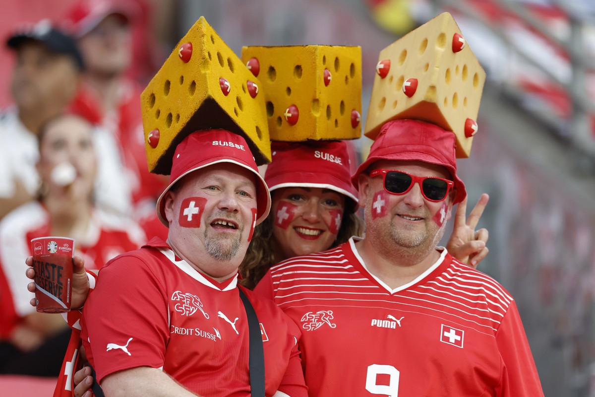 Swiss fans pose prior to a Group A match between Switzerland and Germany at the Euro 2024 soccer tournament in Frankfurt am Main, Germany, Sunday, June 23, 2024. (KEYSTONE/Peter Klaunzer)