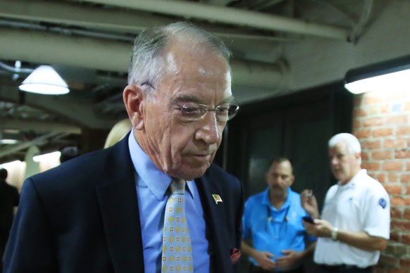 Senate Judiciary Committee Chairman Sen. Chuck Grassley, R-Iowa, walks through a tunnel towards the Dirksen Senate Building on Capitol Hill in Washington, Wednesday, Sept. 19, 2018. (AP Photo/Manuel B ...