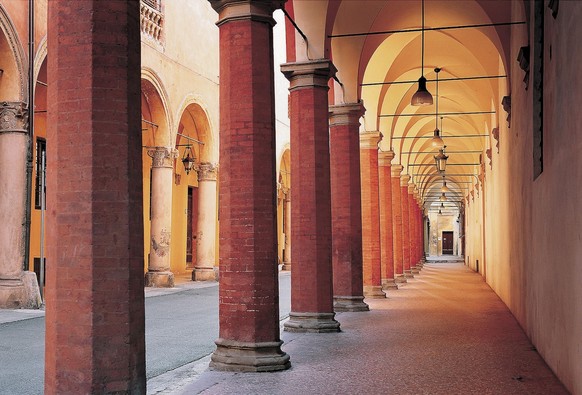 epa09374609 (FILE) - A view of some of the porticoes in Bologna, Italy, 08 May 2018 (reissued 28 July 2021). The Porticoes of Bologna, which cover a stretch of 62 km in the city, became UNESCO World C ...