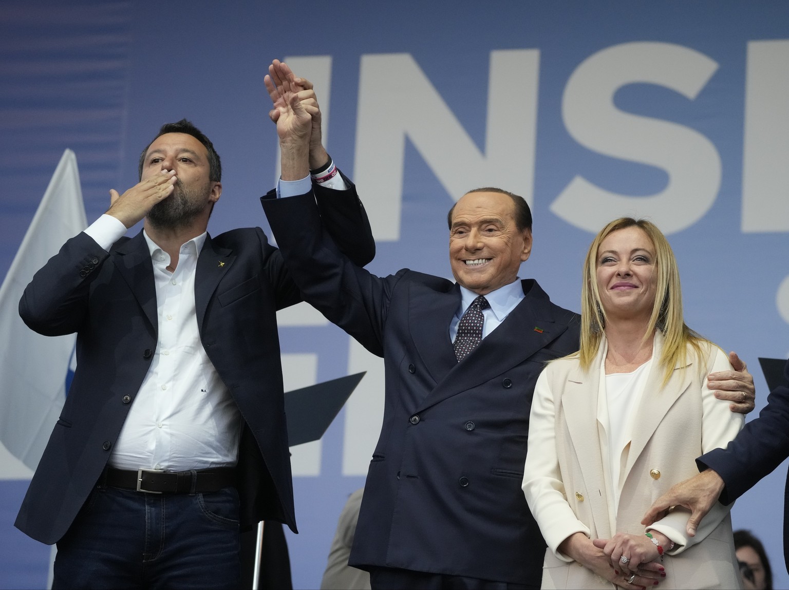 FILE - From left: The League&#039;s Matteo Salvini, Forza Italia&#039;s Silvio Berlusconi, and Brothers of Italy&#039;s Giorgia Meloni attend the center-right coalition closing rally in Rome on Sep. 2 ...