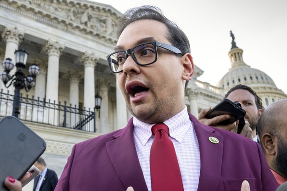 FILE - Rep. George Santos, R-N.Y., speaks to reporters outside the Capitol, in Washington, May 17, 2023. The House Ethics panel says it has found ?substantial evidence? of lawbreaking by Republican Re ...