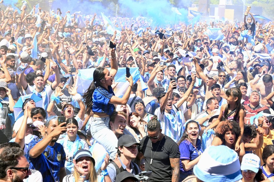 Football World Cup in Qatar People burst into joy at a public viewing site in Buenos Aires on Dec. 18, 2022, following Argentina s victory in the World Cup football final against France in Qatar earli ...