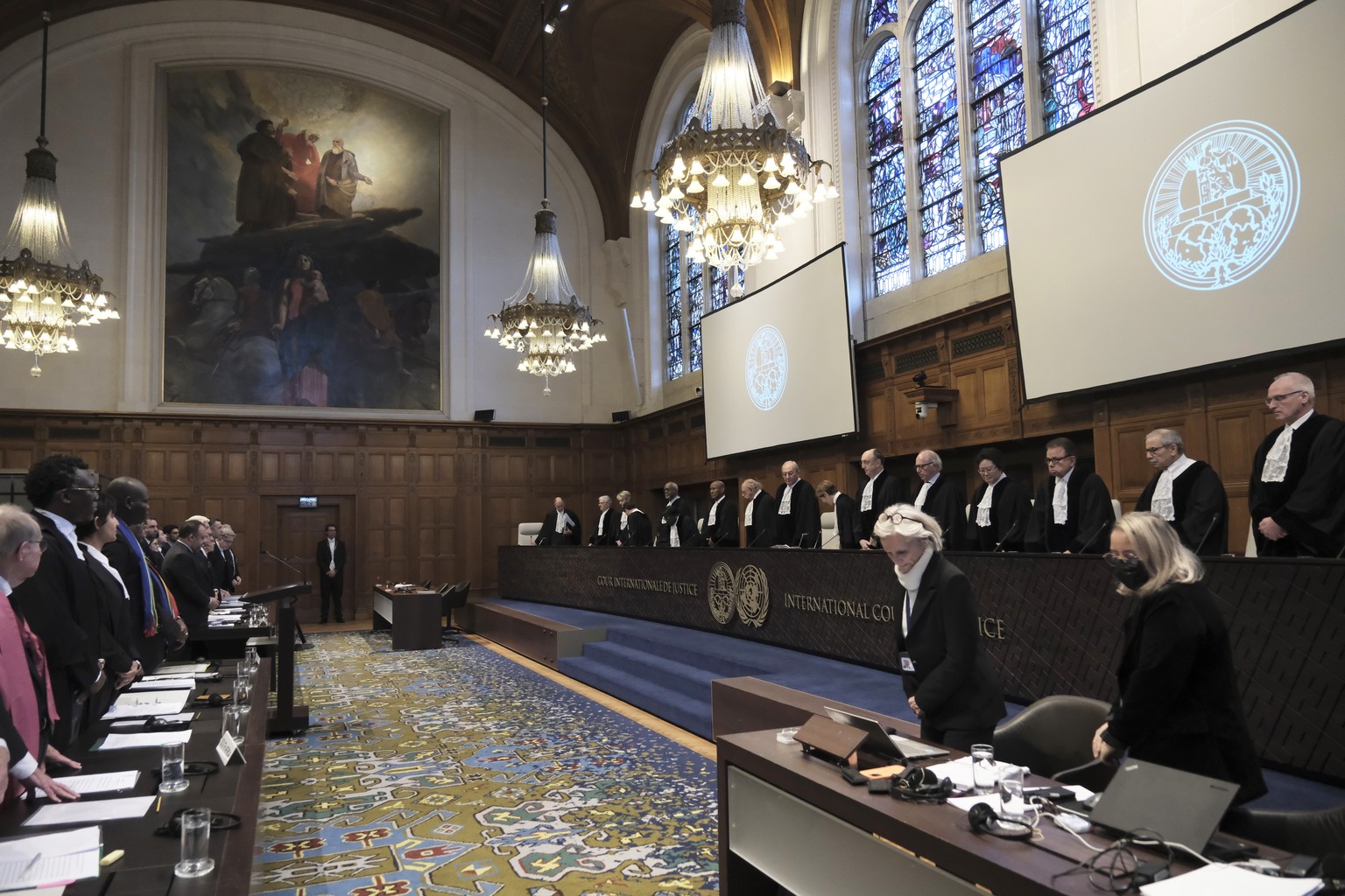Judges and parties stand at the opening of the hearings at the International Court of Justice in The Hague, Netherlands, Thursday, Jan. 11, 2024. The United Nations&#039; top court opens hearings Thur ...