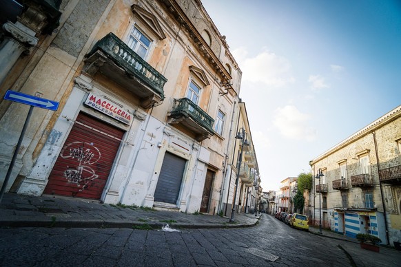 epa08773388 A view of empty streets of the Orta di Atella comune that was declared &#039;red zone&#039; after an increase of coronavirus Covid-19 cases, in Campania region, Naples, Italy, 25 October 2 ...