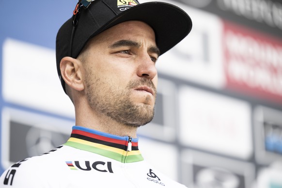 Nino Schurter of Switzerland reacts on the podium after the UCI Cross Country Mountain Bike race, on Sunday, July 10, 2022, in Lenzerheide, Switzerland. (KEYSTONE/Gian Ehrenzeller)