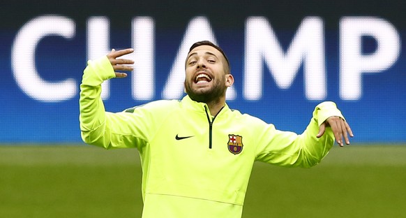 Barcelona&#039;s Jordi Alba gestures, during a training session at the Allianz Arena in Munich, southern Germany, Monday, May 11, 2015. FC Bayern Munich will play against FC Barcelona in a second leg  ...