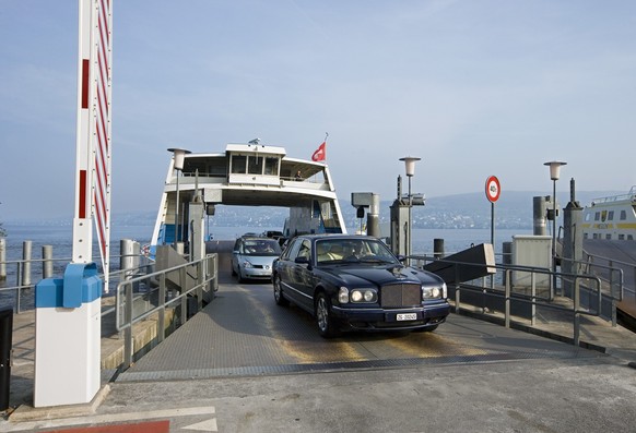Cars drive off the car deck of the car ferry "Zuerisee" at the landing stage in Meilen in the canton of Zurich, Switzerland, pictured on October 10, 2007. The ferry crosses Lake Zurich and p ...